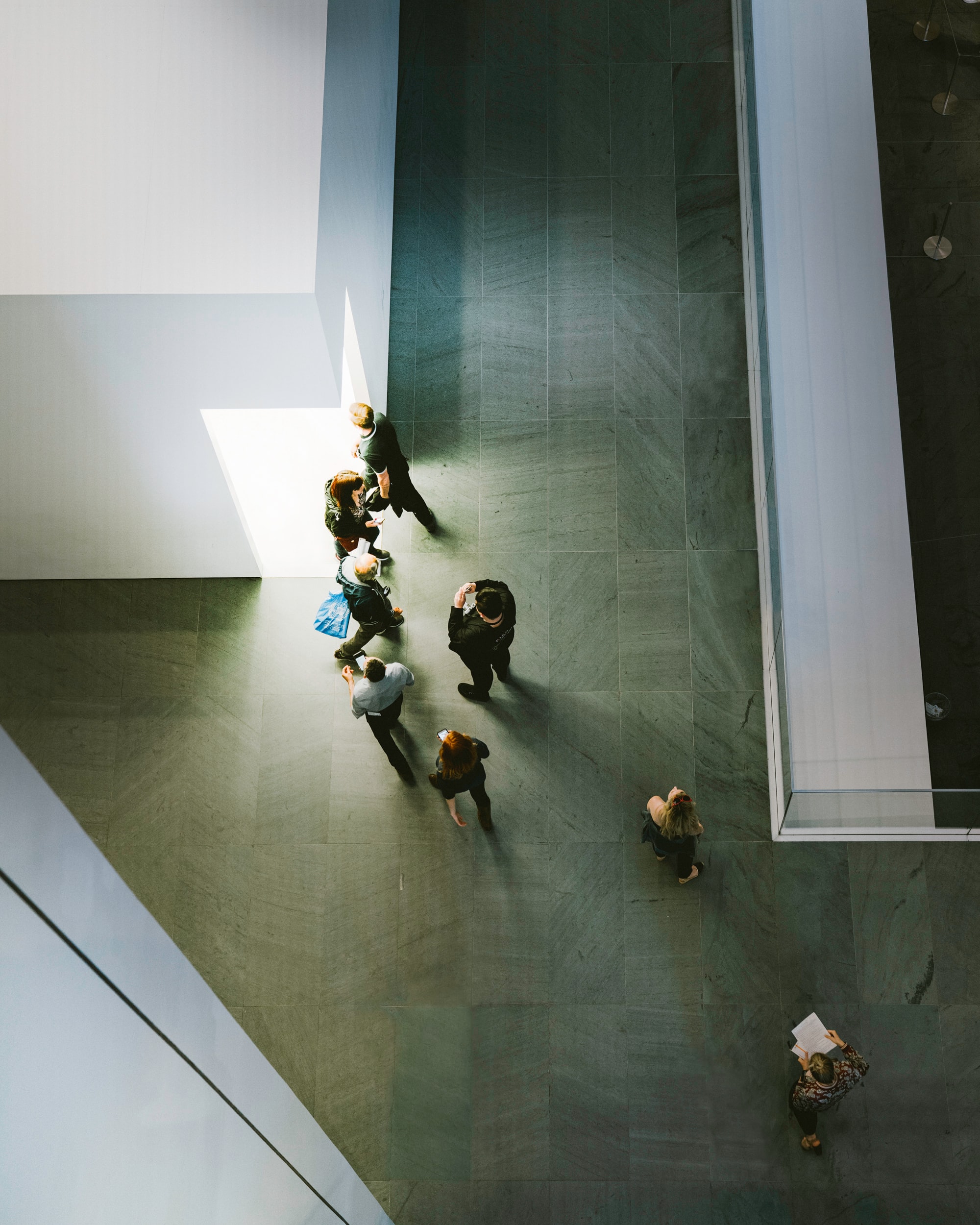 People walking through office