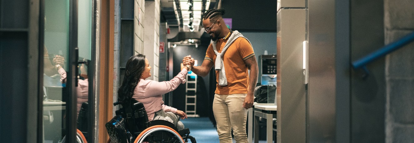 two people engaging in a handshake