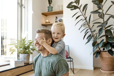 A father and son playing