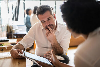 Two people talking